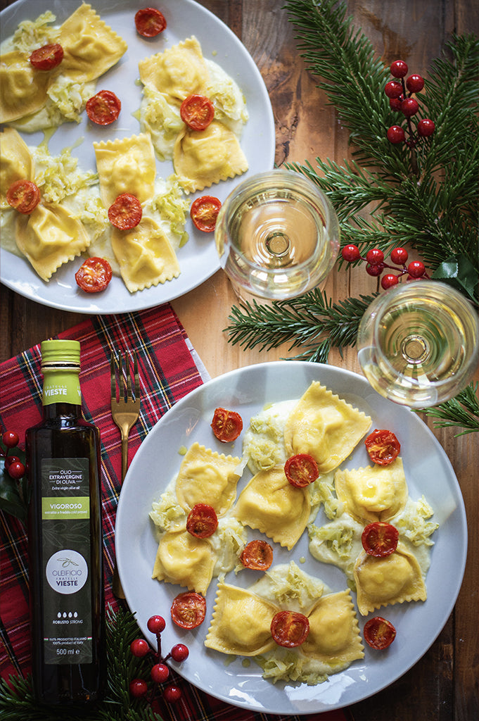 Papillon al baccalà con crema di verza e pomodorini confit