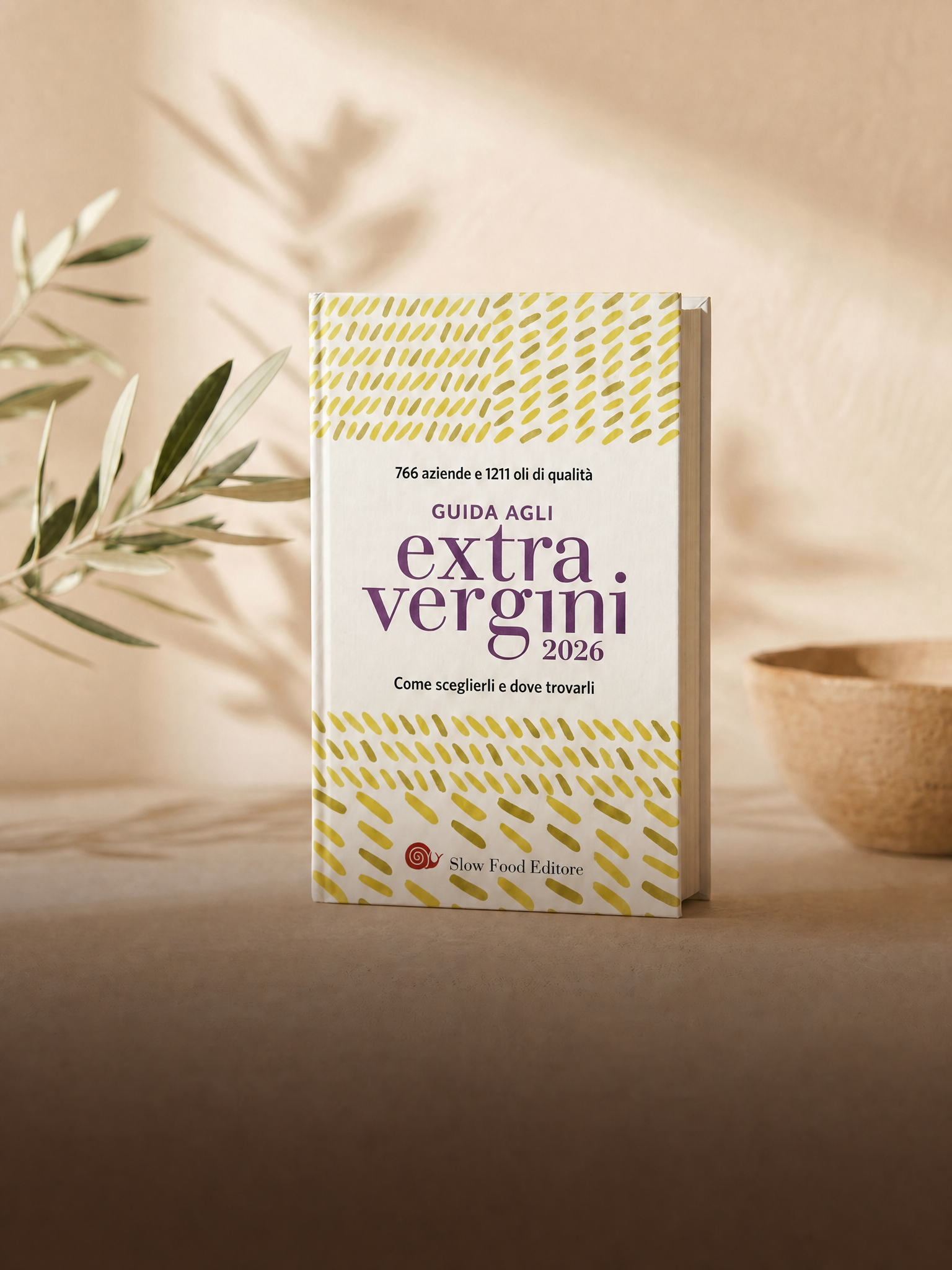 La copertina della Guida agli Extravergini 2026 di Slow Food Editore. Oleificio Fratelli Vieste